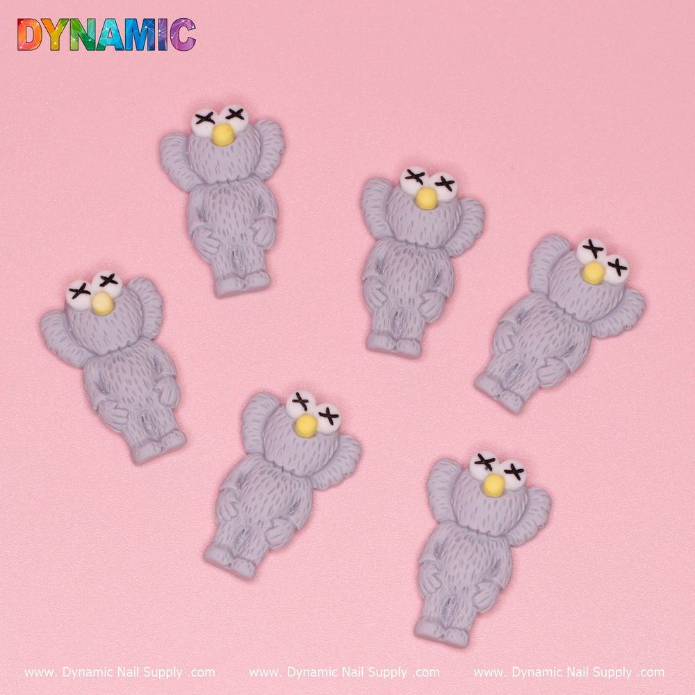 light grey KAWS nail charms - 2